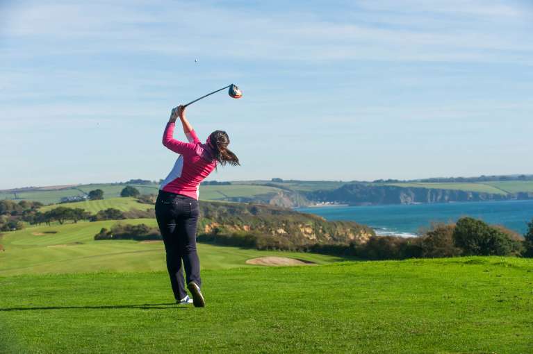 Carlyon Bay Hotel Golfer on Golf Course Overlooking Sea