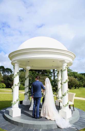 Wedding gazebo with bridge & groom