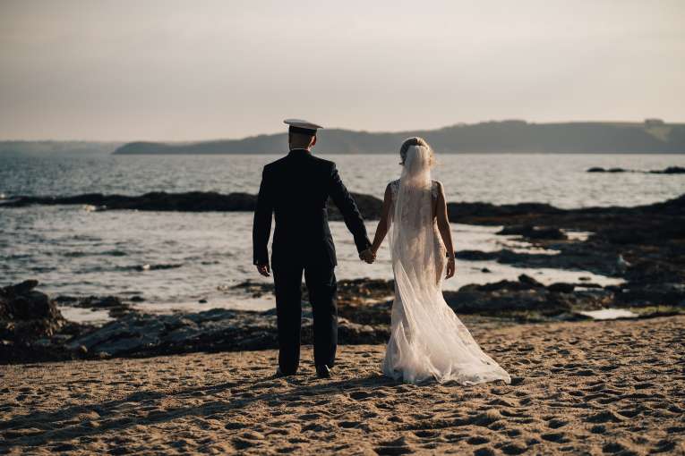 Evening Walk Bride and Groom on Carlyon Beach