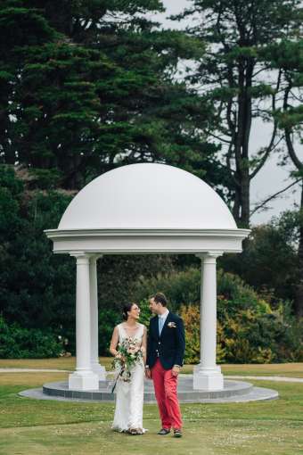 Bride and Groom Walking Outside Carlyon Bay Hotel