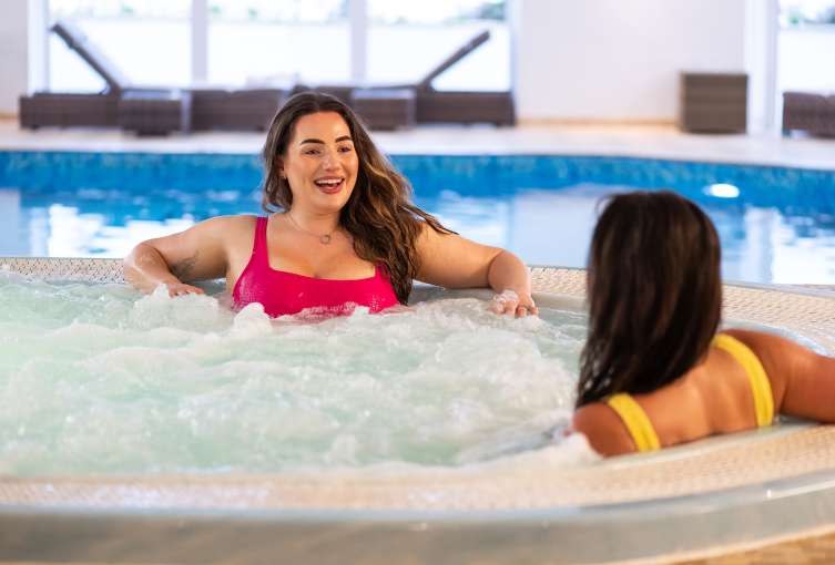woman relaxing in spa bath